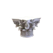 Corinthian column capital with ornate acanthus leaves and classical old world European detailing in a Renaissance style