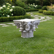 Corinthian column capital with ornate acanthus leaves and classical old world European detailing in a Renaissance style Side Angle