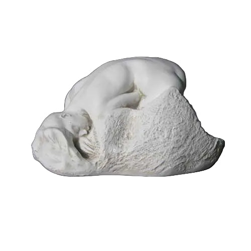 Reclining classical sculpture of a sleeping dog with ornate, old world European and Renaissance-inspired detailing.