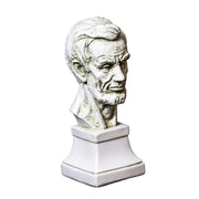 Classical bust sculpture with detailed facial features and beard, set on a square pedestal in Renaissance-inspired style.