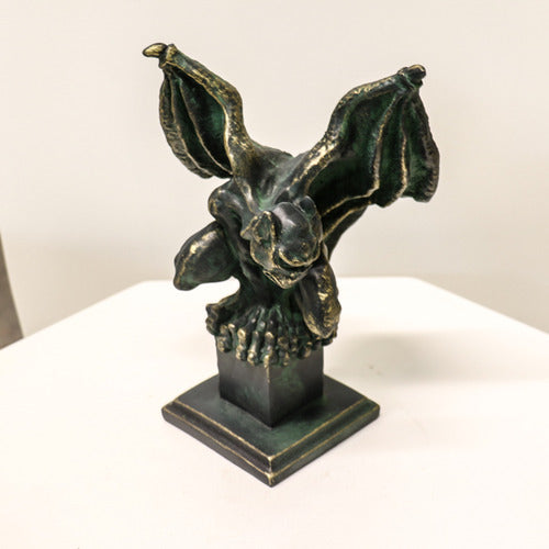 Gothic gargoyle statue with outstretched wings and crouching pose on a square pedestal, featuring ornate medieval detailing. Different Angle