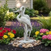 Pair of herons in an ornate, old world European style with detailed feathers and classical sculptural elegance. Side Angle
