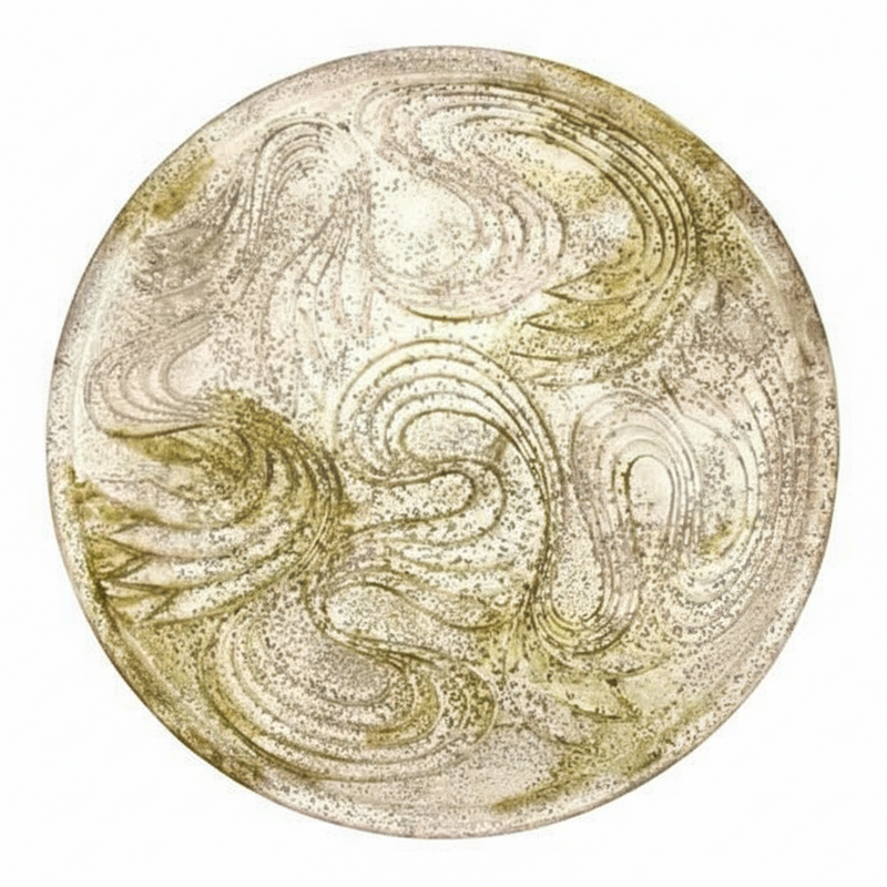 Ornate round plate featuring swirling, old world European patterns with a classical, Renaissance-inspired decorative motif.