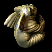 Grotesque gargoyle door knocker with exaggerated features, medieval Gothic style, ornate detailing, fierce expression, old world European theme Different Angle