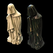 Hooded medieval figure statue with draped, flowing robes in an old world European Gothic style, facing away. Different Angle