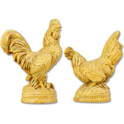 Baroque-style rooster and hen figurines with ornate detailing and classical European sculptural accents on round bases.