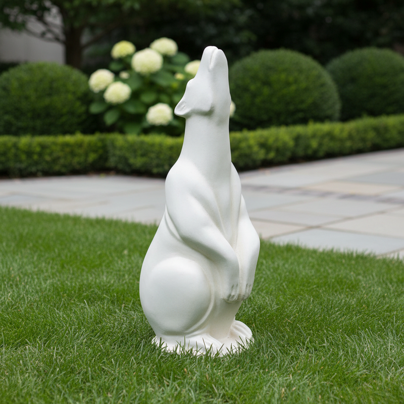 Howling wolf statue with smooth, classical lines and subtle old world European sculptural details Side Angle