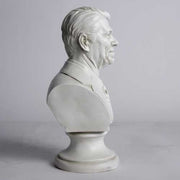 Classical-style bust of a distinguished man in a suit and tie with detailed facial features and an ornate pedestal base. Other Angle