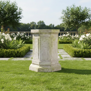 Octagonal pedestal with classical old world European design, featuring paneled sides and subtle ornate detailing with a weathered finish. Side Angle