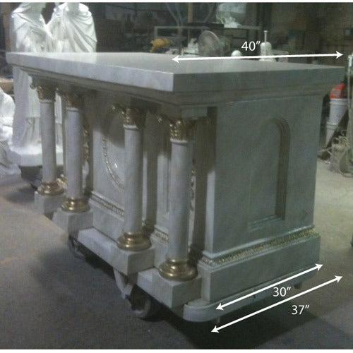 Classical altar with ornate Baroque columns, gold accents, and a central medallion, featuring old world European architectural details. Side Angle