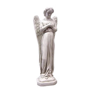 Standing angel with a serene expression and hands in Chest, featuring large wings with leaf/floral patterns on a rectangular base.