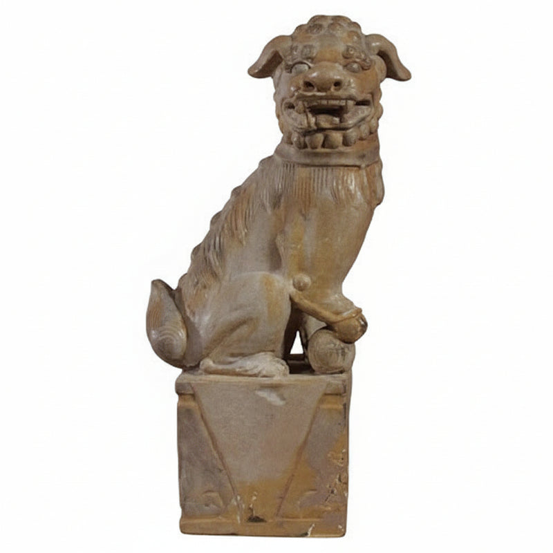Foo dog statue with ornate, classical detailing, seated on a square pedestal in an old world European style.