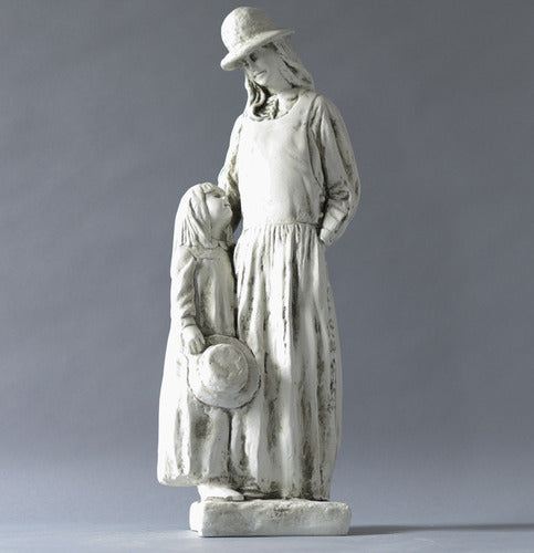 Mother and child statue in old world European style, featuring classical draped clothing and gentle, ornate detailing. Side View