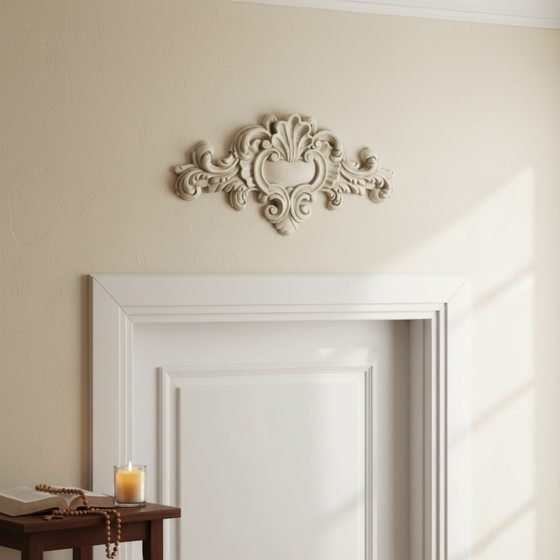 Ornate Baroque-style architectural applique with symmetrical scrollwork, acanthus leaves, and classical old world European detailing. Side Angle