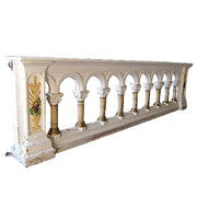 Ornate old world European balustrade with classical arches, Corinthian columns, and decorative Baroque detailing on end panels.