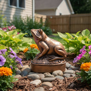 Frog figurine with ornate detailing, classical old world European style, perched on an oval base with subtle decorative accents. Side Angle