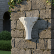 Fluted classical column capital with fan-shaped, symmetrical design and subtle Art Deco and Greek Revival influences. Side Angle