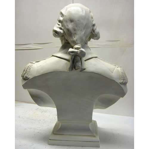 Classical old world European bust of a man in ornate military attire with ruffled cravat and detailed epaulets on shoulders. Different Angle