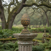 Ornate old world European finial with classical acanthus leaf detailing and a Baroque-inspired pedestal base. Side Angle