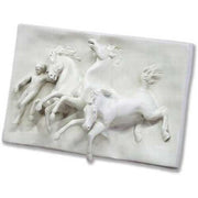 Classical bas-relief featuring a youth and two galloping horses in dynamic, ornate old world European style.