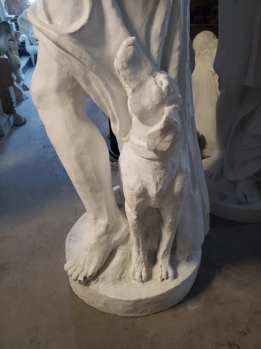 Classical Renaissance-style male statue with draped cloth, standing beside a dog, featuring detailed, lifelike sculptural elements. Side View