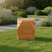 Ancient rectangular stone block with weathered inscriptions, featuring classical old world European architectural detailing. Side Angle