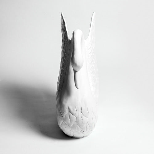 Swan sculpture with detailed feather carvings, classical European style, featuring an elegant curved neck and ornate wing design. Different Angle