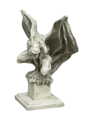 Gothic gargoyle statue with outstretched wings and crouching pose on a square pedestal, featuring ornate medieval detailing.