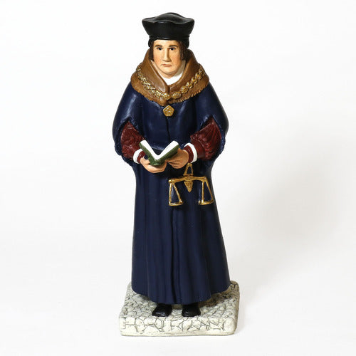 Renaissance-style figurine of a scholar in ornate robes holding a book and scales, featuring classical European details.