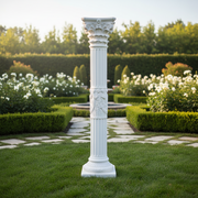 Corinthian column with ornate acanthus leaf capital, fluted shaft, and classical old world European architectural detailing Side Angle