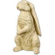 Standing rabbit statue with detailed fur, upright posture, and classical old world European style reminiscent of medieval garden art.
