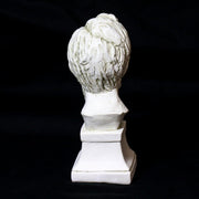 Classical bust sculpture with detailed facial features and beard, set on a square pedestal in Renaissance-inspired style. Side Angle