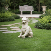 Baroque-style ornate lion statue with curled mane, tassel necklace, and detailed ball under paw, evoking old world European charm. Side Angle