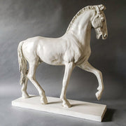 Classical European horse statue with ornate detailing, Renaissance-inspired pose, and elegant, lifelike musculature on a rectangular base. Side View
