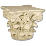 Corinthian column capital with ornate acanthus leaves and scrollwork in classical old world European architectural style.