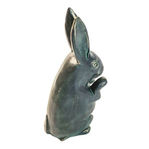 Standing rabbit sculpture with upright ears, detailed paws, and an old world European, slightly weathered, classical style. Different Angle