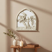 Gothic-style ornate wall plaque featuring angels and a robed figure in high relief within a pointed arch frame. Side Angle