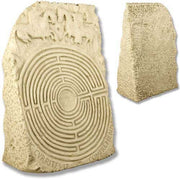 Stone tablet featuring an ornate medieval labyrinth design with classical relief carvings and Latin inscription, old world European style.