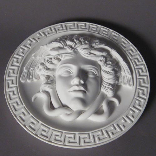 Medusa head relief with flowing serpentine hair, surrounded by a Greek key border in classical old world European style. Other Angle