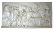 Classical Greek relief sculpture depicting figures leading horses in an ornate, old world European style with Renaissance influences.