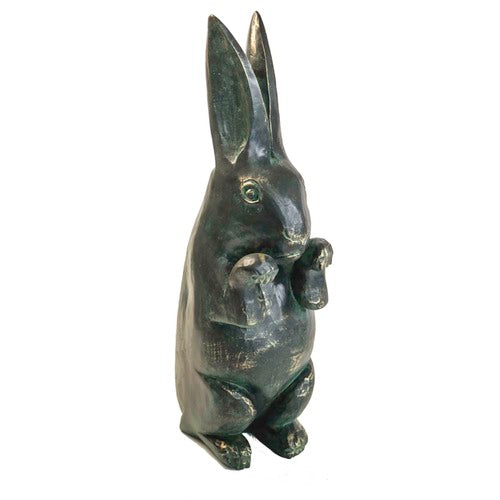 Standing rabbit sculpture with upright ears, detailed paws, and an old world European, slightly weathered, classical style.