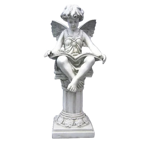 Cherub With small wings sitting cross-legged reading a book on a column pedestal.