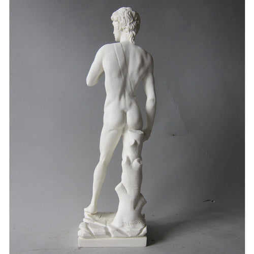 Classical Renaissance male statue with detailed anatomy, standing in contrapposto pose, inspired by old world European sculpture. Side Angle