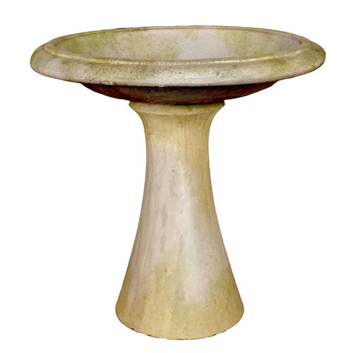 Ornate old world European bird bath with a wide, shallow basin and classical pedestal base, featuring subtle weathered detailing.