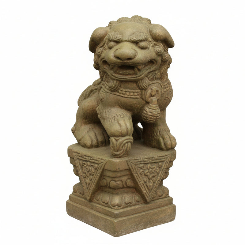Foo dog statue with ornate detailing, classical Asian guardian style, seated on a decorative pedestal with intricate carvings.