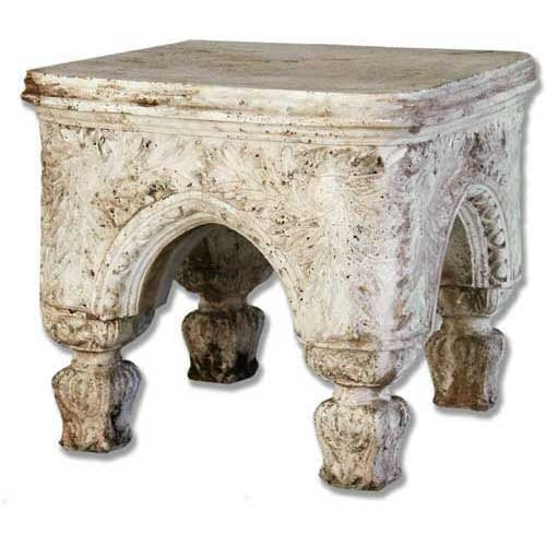Ornate old world European stool with classical arches, intricate Baroque carvings, and four sculpted legs in a medieval style.