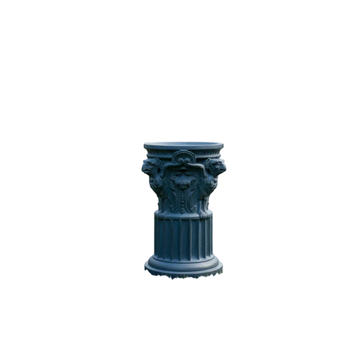 Classical pedestal with ornate lion head details and fluted column, inspired by old world European and Renaissance architectural styles