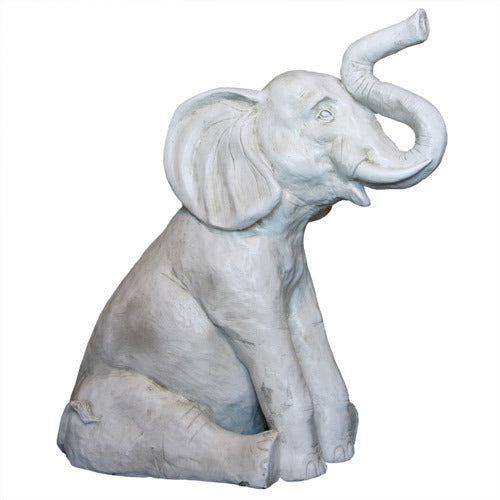 Seated elephant statue with raised trunk, featuring ornate, classical European sculptural details and old world charm.