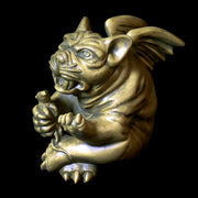 Grotesque gargoyle door knocker with exaggerated features, medieval Gothic style, ornate detailing, fierce expression, old world European theme Side View