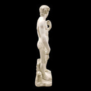 Classical Renaissance male statue with detailed anatomy, curly hair, and contrapposto stance on a rectangular base. Different Angle